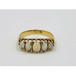 18ct gold ring set with five opals