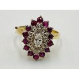 9ct gold ring set with diamonds and pink sapphires