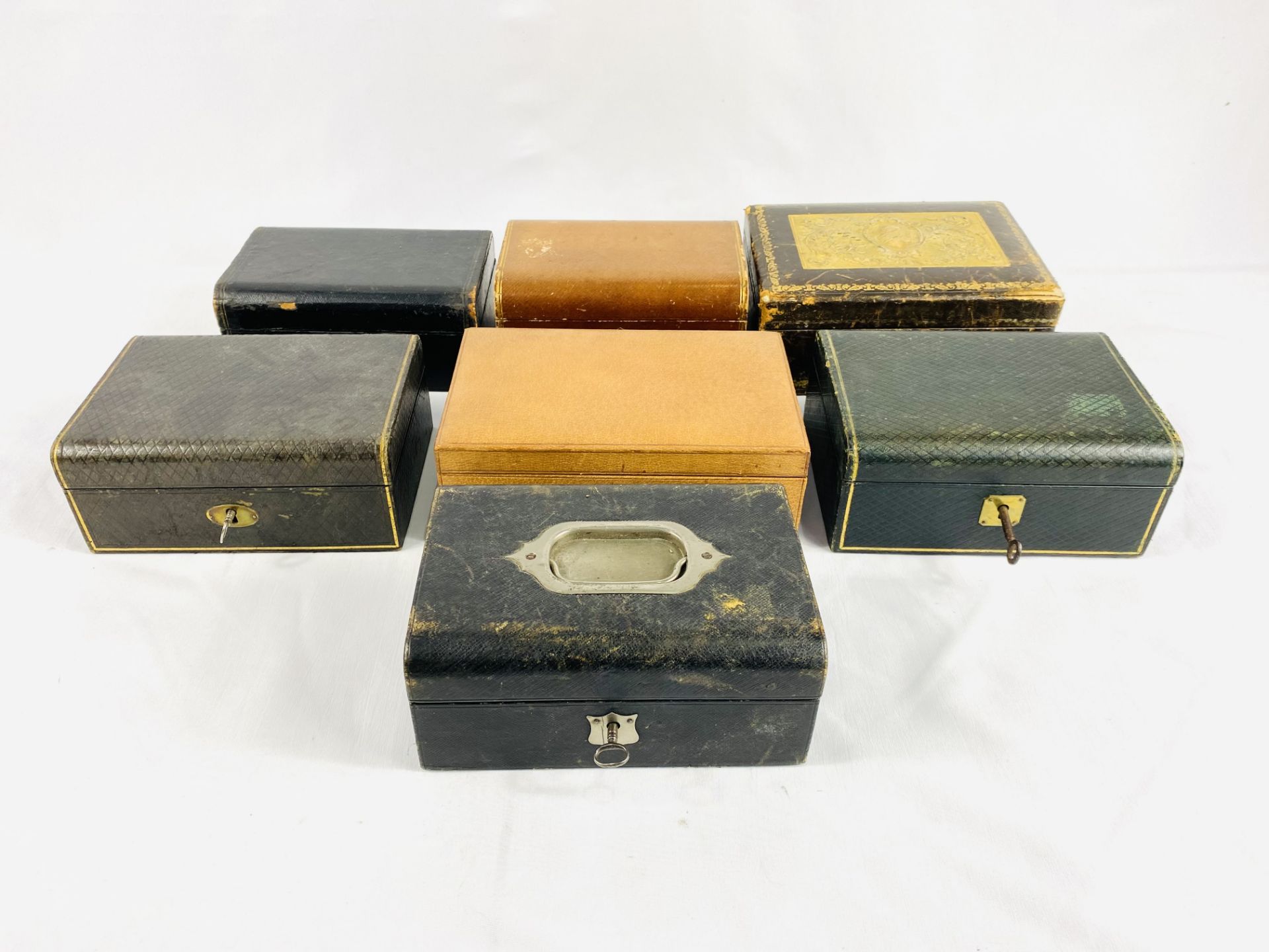 Seven leather jewellery boxes