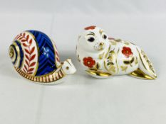 A Royal Crown Derby seal paperweight; together with a Royal Crown Derby snail paperweight,