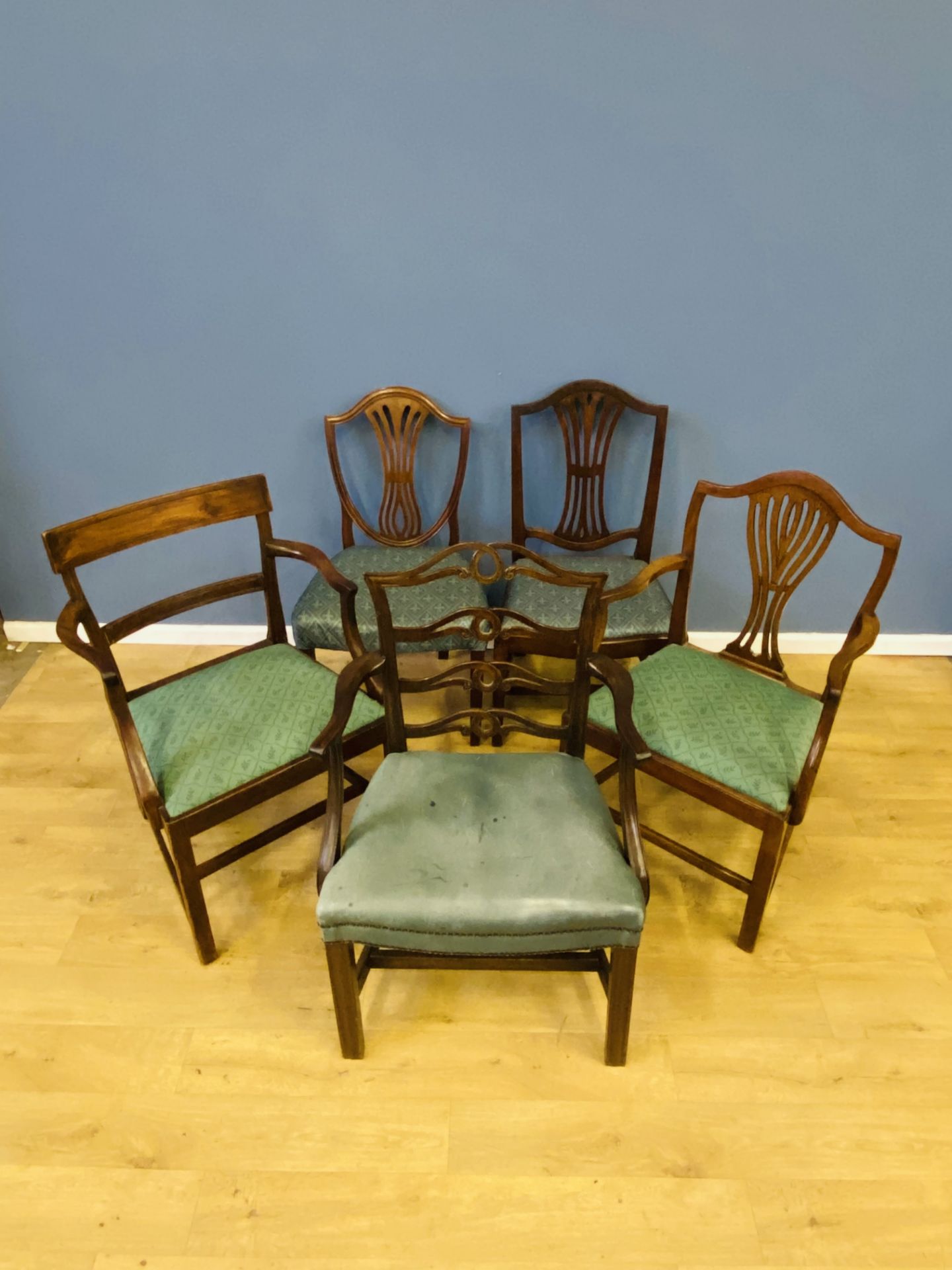 Five chairs, to include three elbow chairs