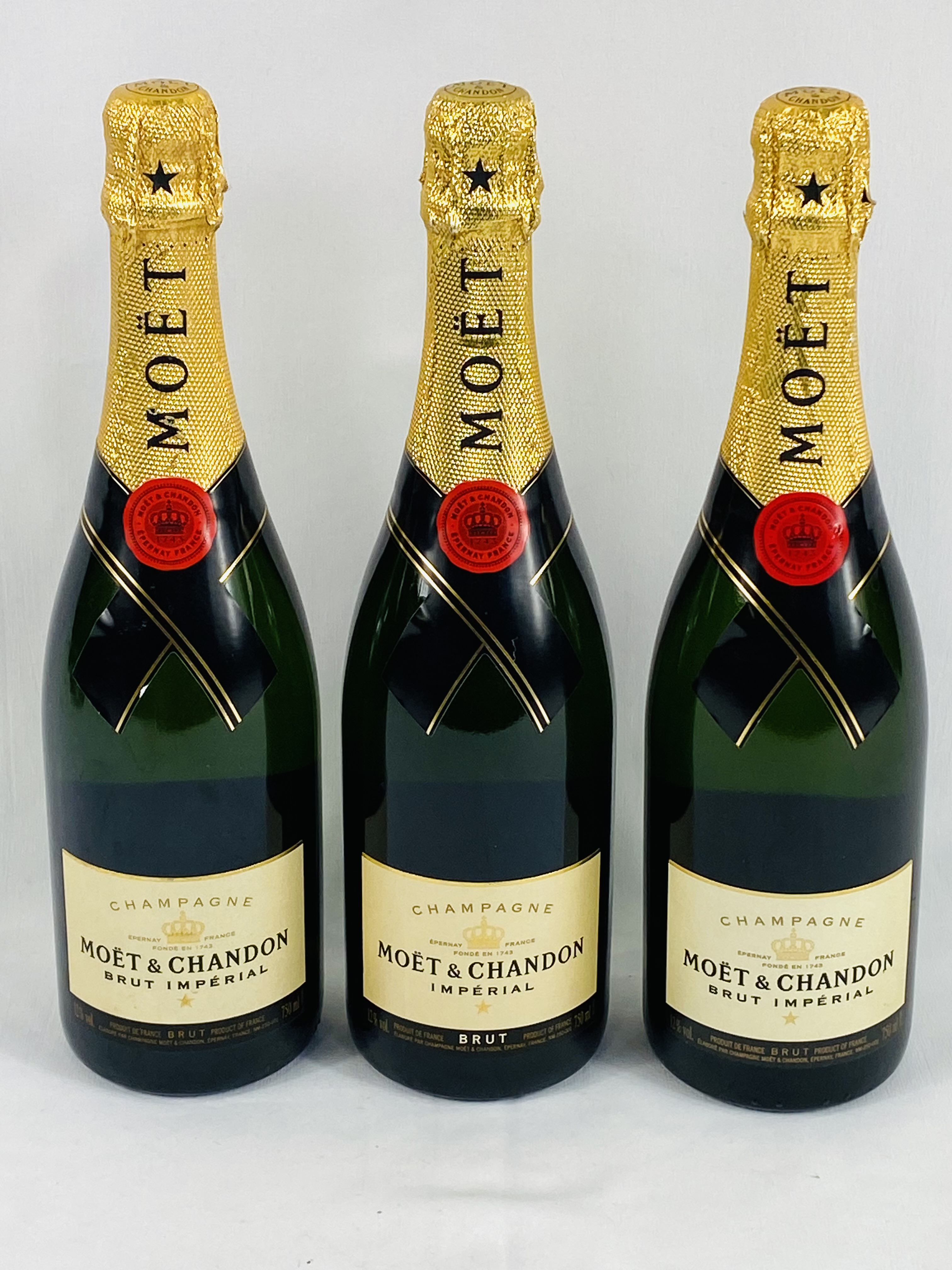 Three 75cl bottles of Moet & Chandon Brut Imperial Non Vintage Champagne.