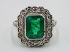 18ct white gold, emerald and diamond ring