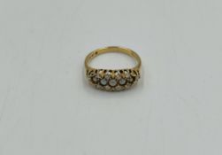 19ct gold ring set with diamonds and pearls