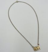 Silver necklace with 14ct gold pendant by Leonore Doskow