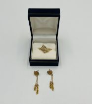 10ct gold ring together with a matching pair of 10ct gold earrings