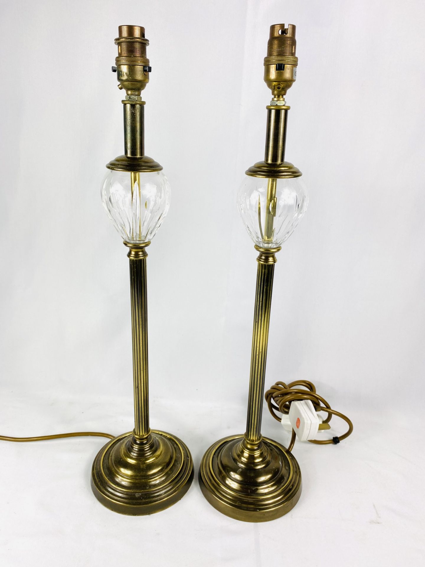 Pair of fluted brass and glass table lamps