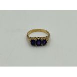 9ct gold ring set with three amethysts