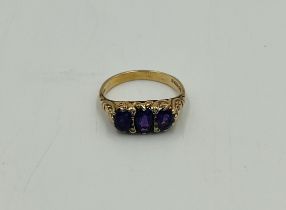 9ct gold ring set with three amethysts