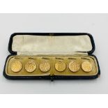 Boxed set of six 9ct gold buttons