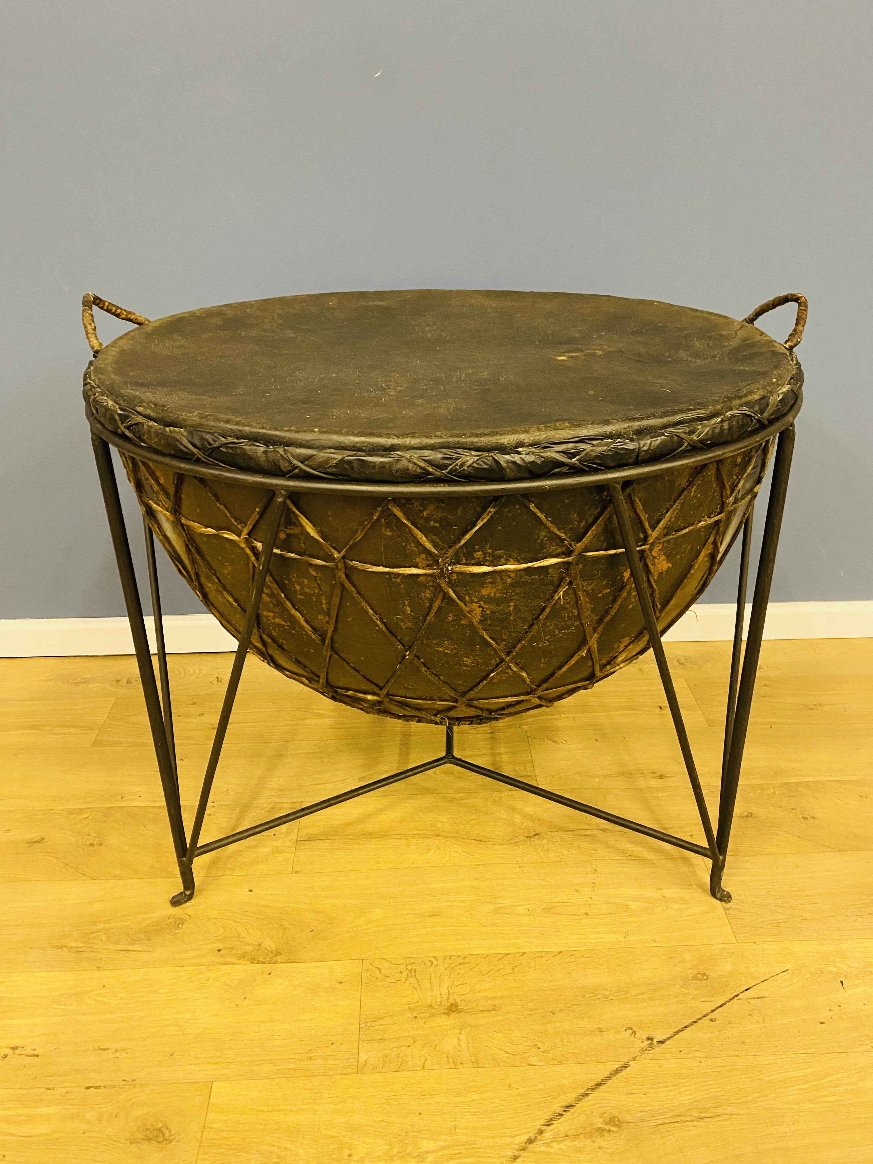Contemporary African drum on metal stand