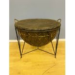 Contemporary African drum on metal stand