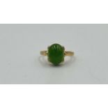 10ct gold ring set with a jade cabochon