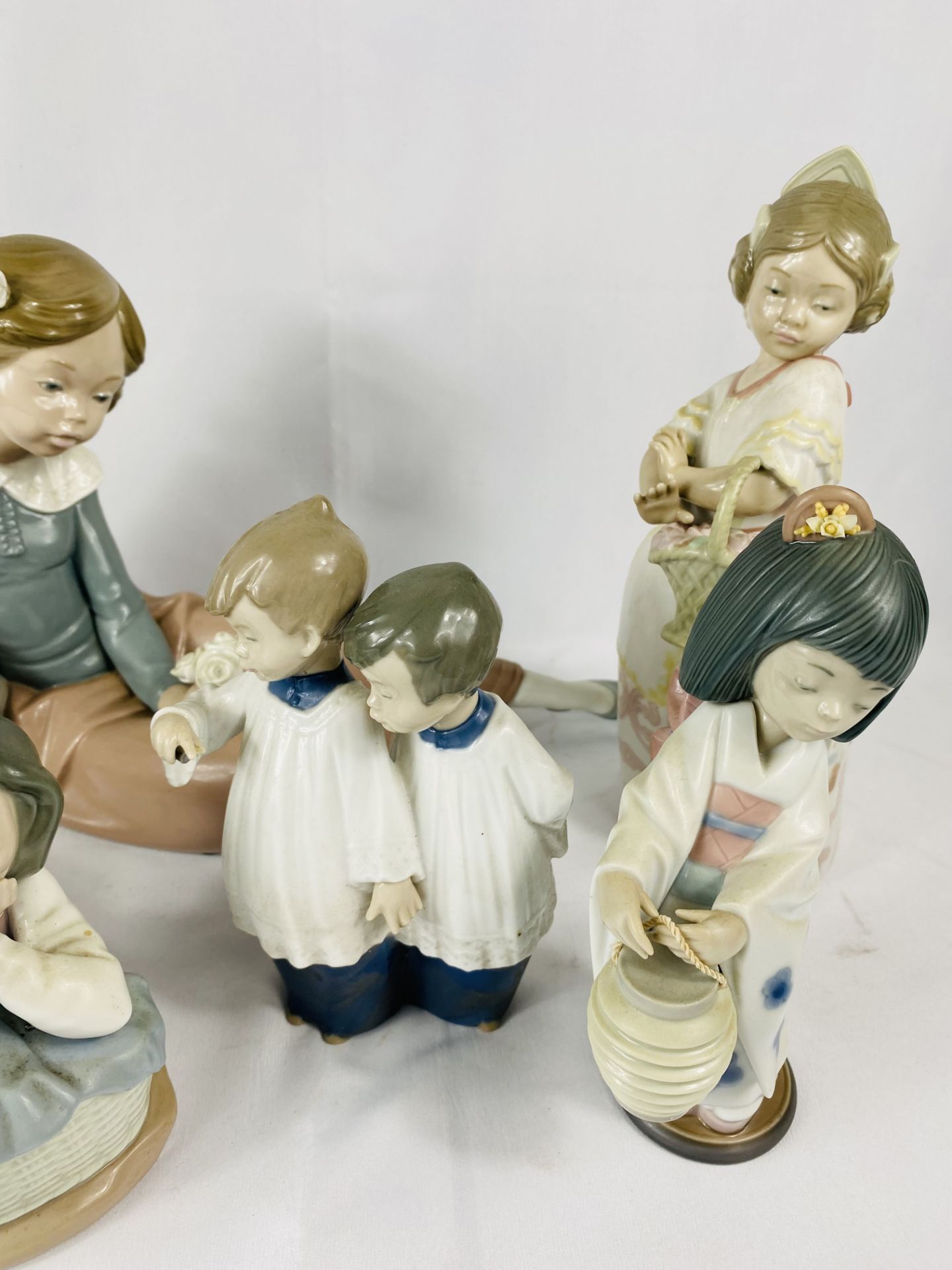 Three Nao figurines, a Lladro figurine and one other - Image 2 of 3