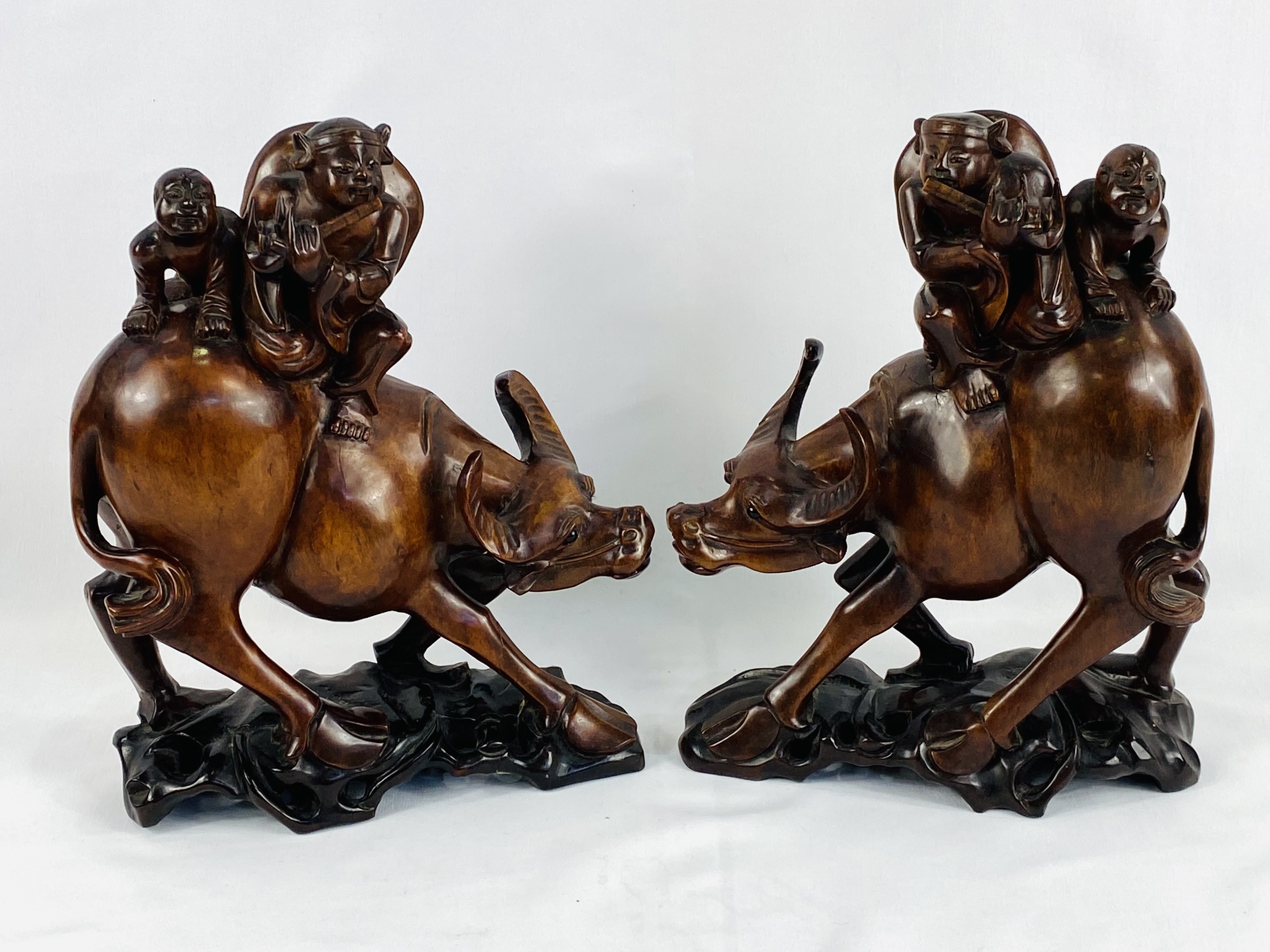 Pair of carved wood figures