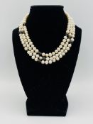 Long pearl and topaz necklace