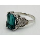 18ct white gold and tourmaline ring with diamond shoulders