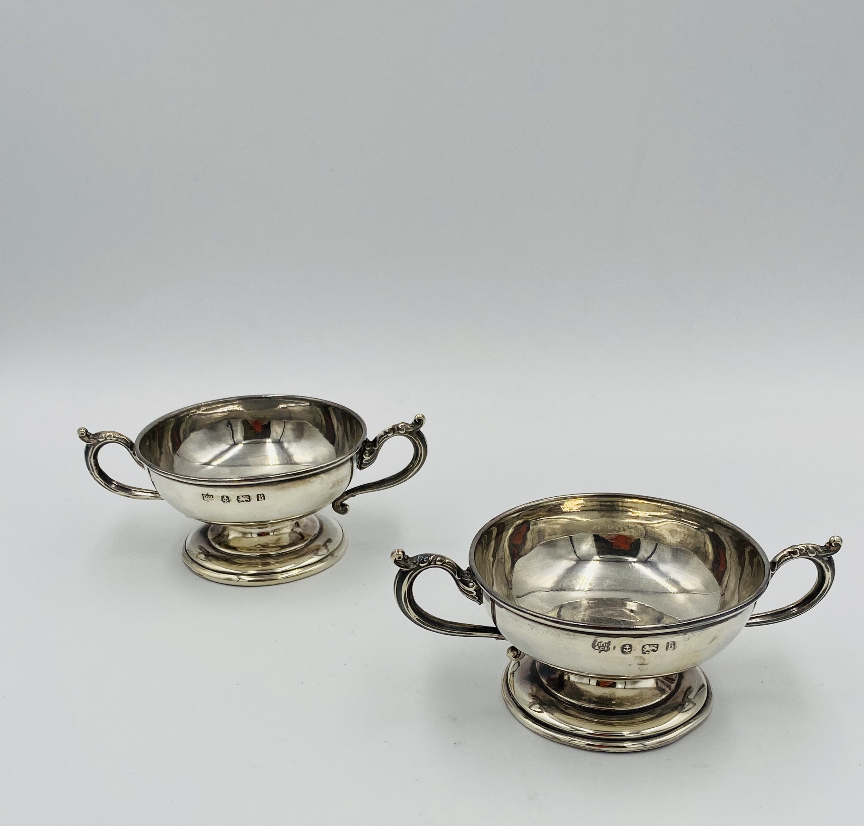 Pair of twin handled low cups