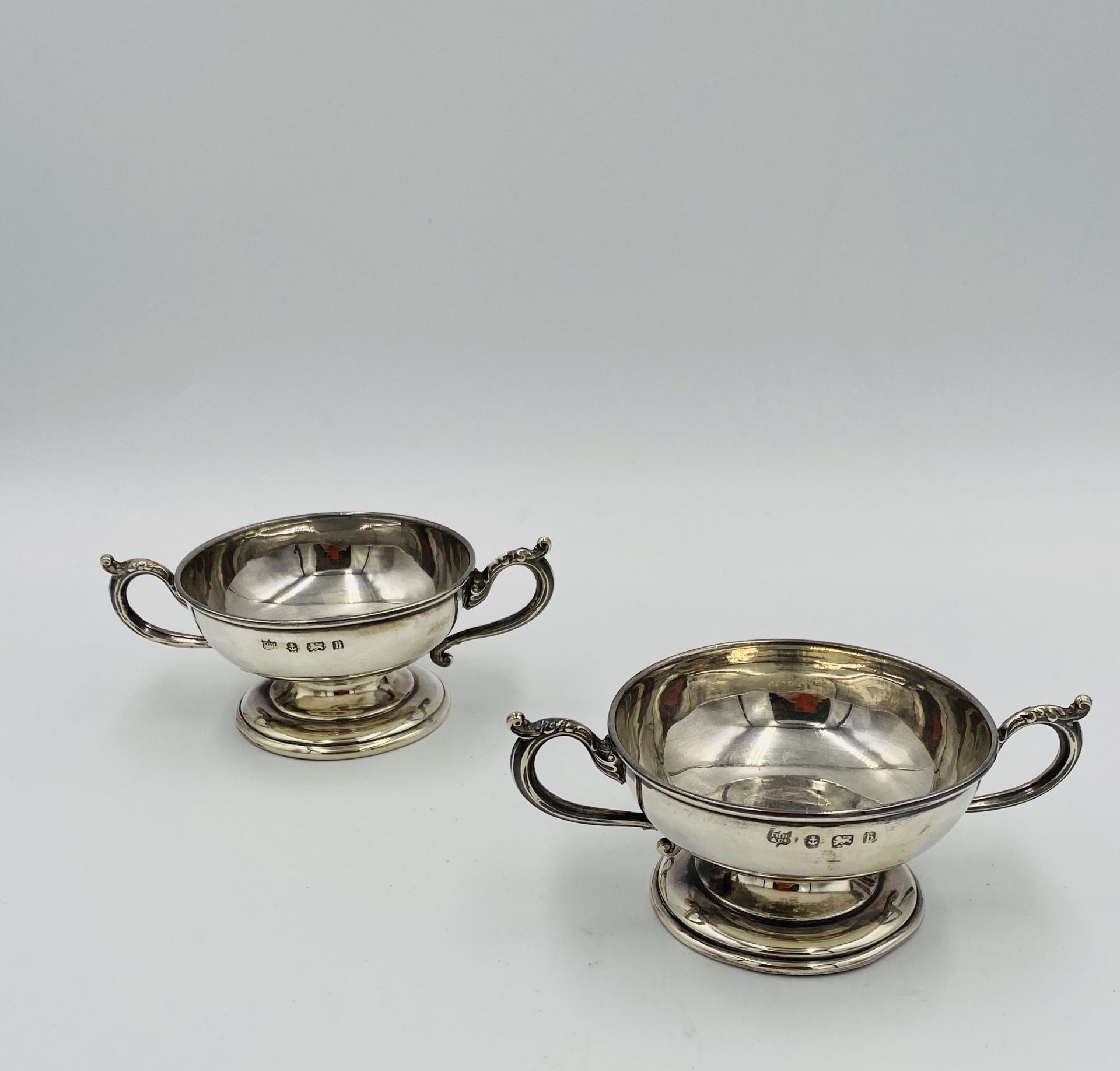 Pair of twin handled low cups