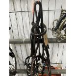 Two full size bridles: one snaffle, one gag without reins.