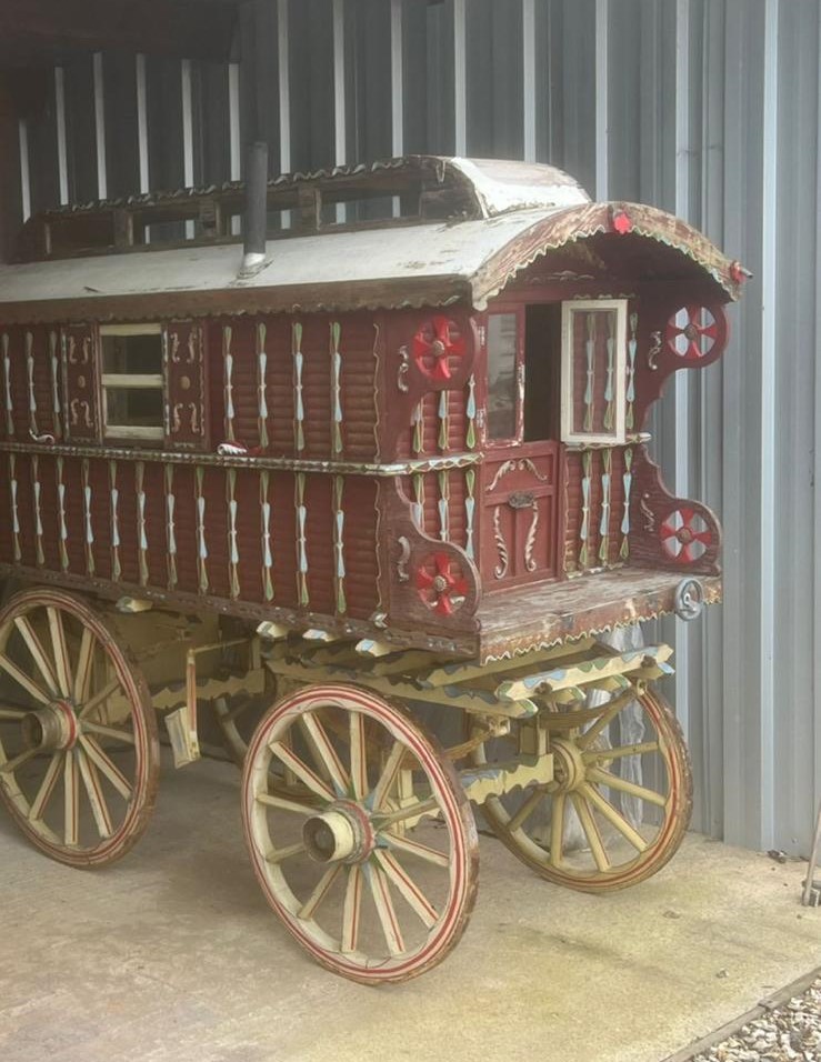 CHILD'S READING WAGON painted red with cream-lined chamfers cream wheels