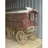 CHILD'S READING WAGON painted red with cream-lined chamfers cream wheels