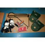 Assorted stable items including haynets, saddle rack and a grooming kit