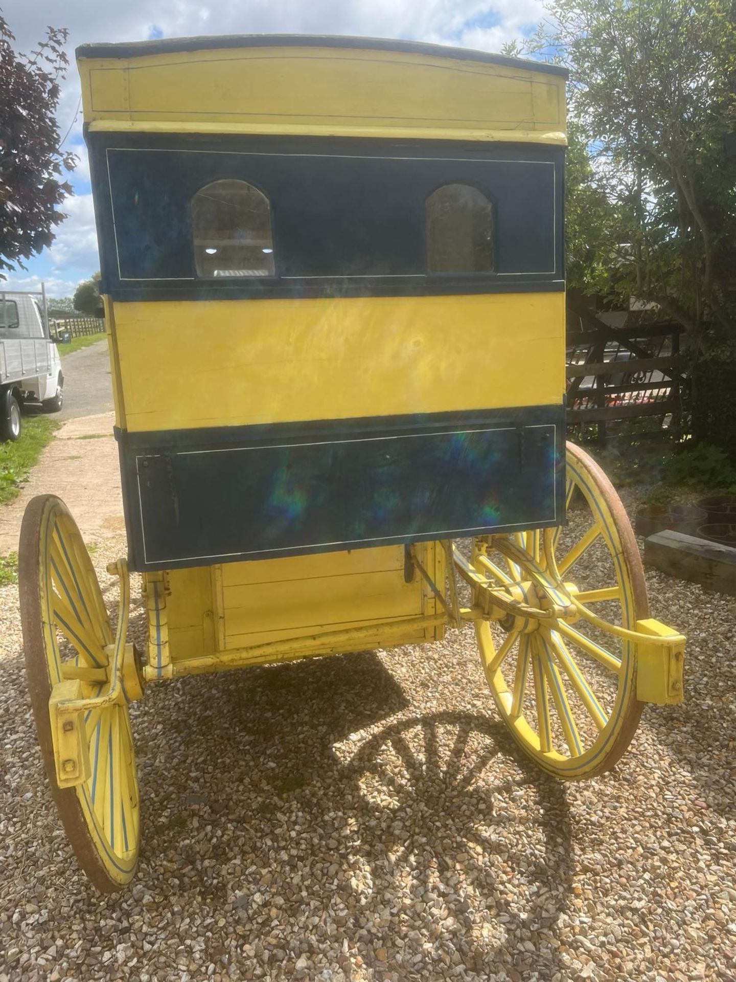 AMERICAN BUTCHER'S SHOP, a 4-wheeled enclosed van painted dark blue and yellow on iron tyres. - Image 4 of 14