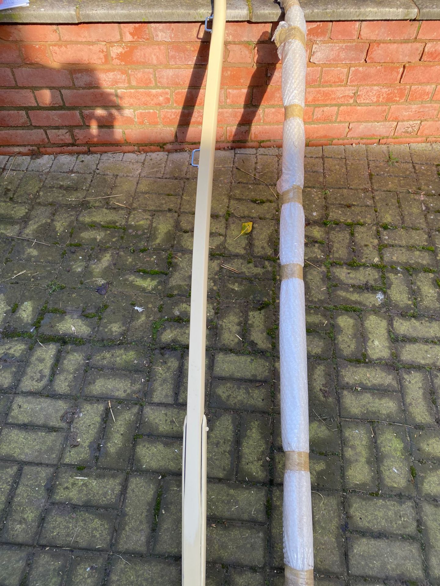 Set of shafts to suit a Landau, cream with chrome fittings