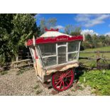 ICE CREAM VAN, a two-wheeled vehicle with rubber tyred wheels painted red.