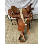 Western saddle with bridle and rug, size 17"
