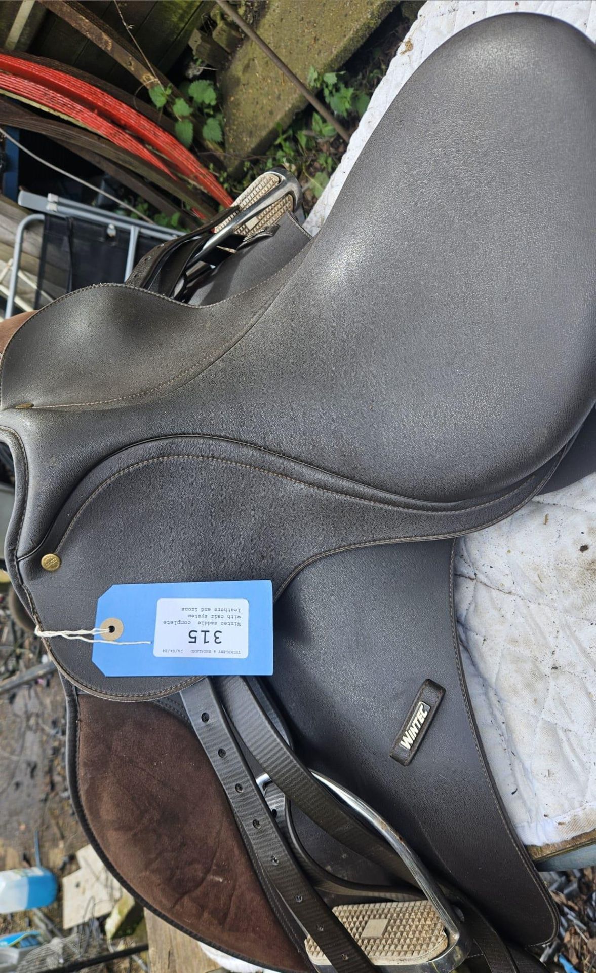 Wintec saddle, complete with cair system, leathers and irons