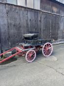 PONY-SIZE LONDON TROLLEY featuring a red undercarriage and dark blue body suitable for a single pony