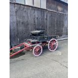 PONY-SIZE LONDON TROLLEY featuring a red undercarriage and dark blue body suitable for a single pony