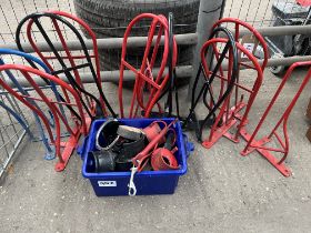 11 saddle racks together with 13 bridle brackets and 3 bridle hooks