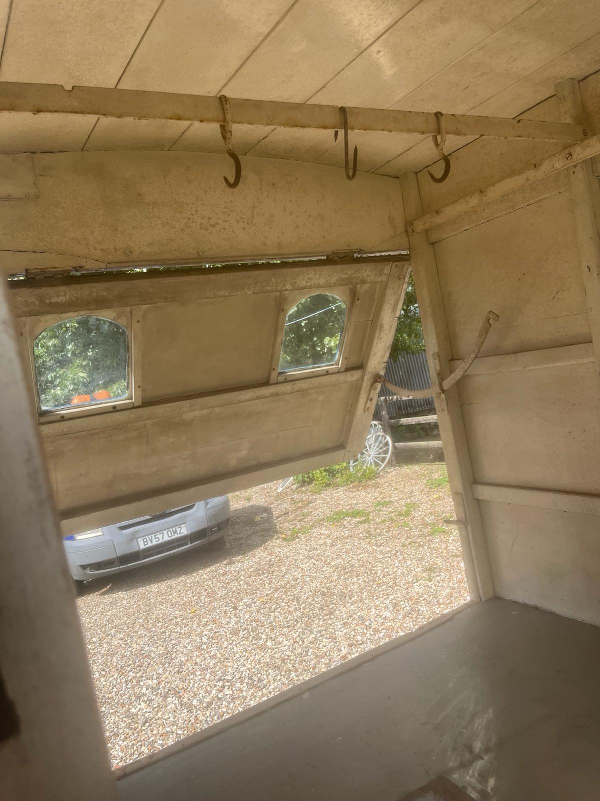 AMERICAN BUTCHER'S SHOP, a 4-wheeled enclosed van painted dark blue and yellow on iron tyres. - Image 9 of 14