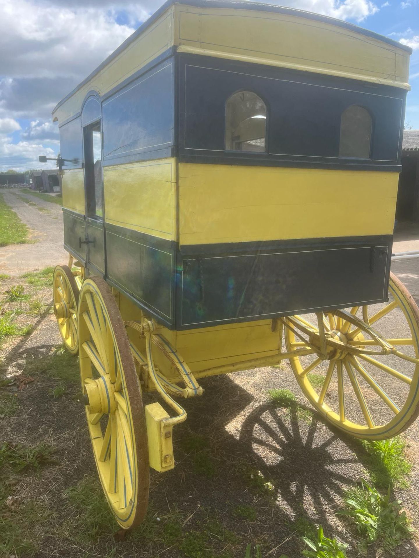 AMERICAN BUTCHER'S SHOP, a 4-wheeled enclosed van painted dark blue and yellow on iron tyres. - Image 5 of 14