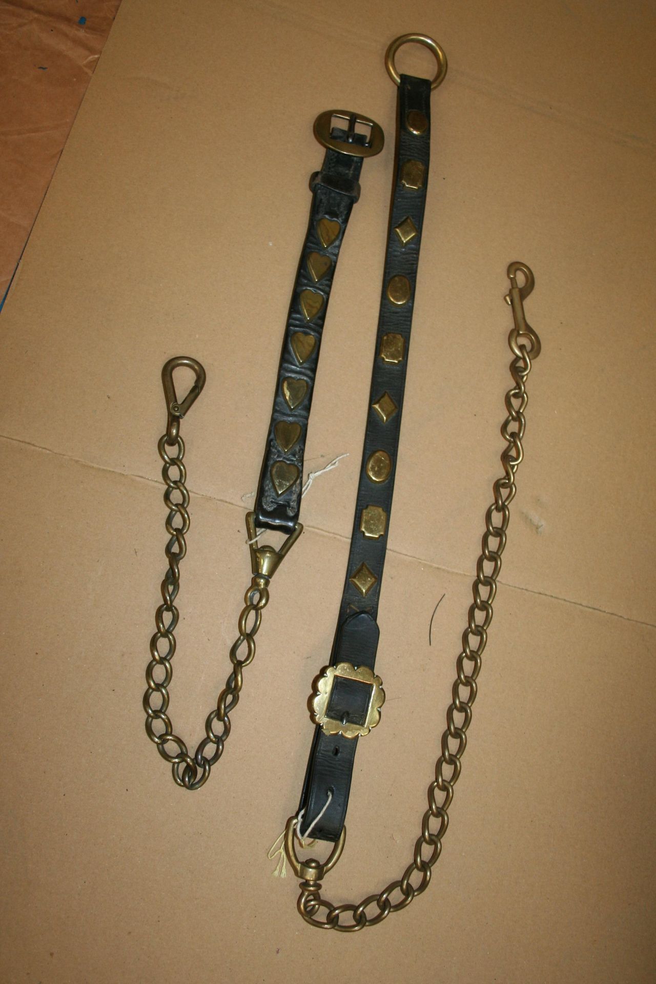 Two heavy horse lead reins with brass decoration studs