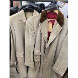 Full length beige coachman's coat with brown collar, together with a long beige coat by Aquascutum