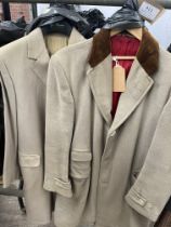 Full length beige coachman's coat with brown collar, together with a long beige coat by Aquascutum