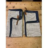 Pair of Tattersall check aprons with leather buckles