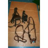 Two driving bridles with two in hand bridles