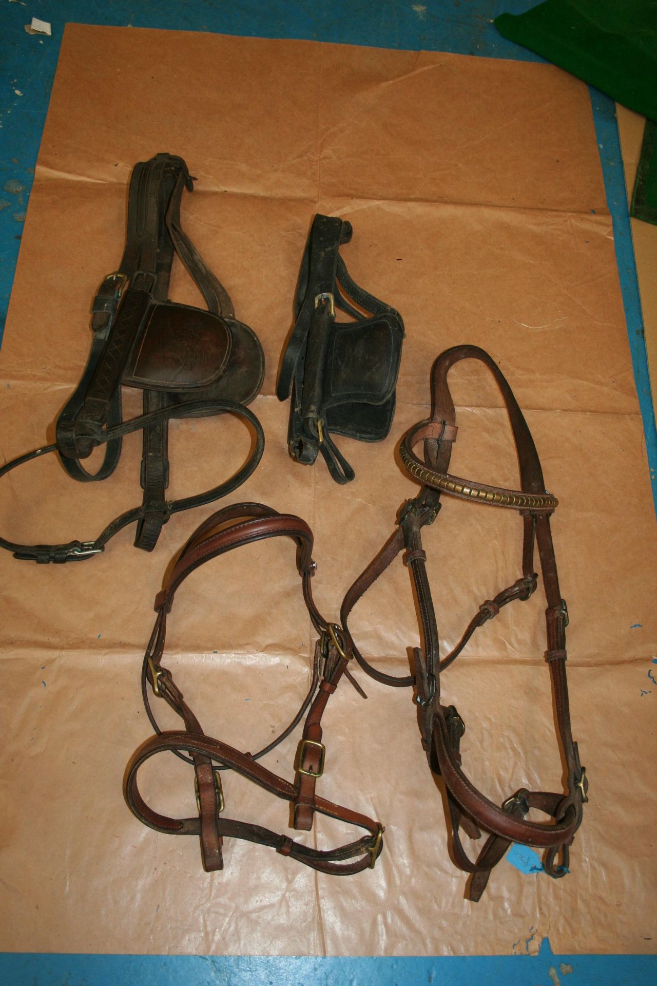 Two driving bridles with two in hand bridles