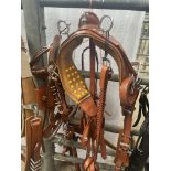 Set of brown trade harness with 22-inch collar and white metal fittings. This lot carries VAT.