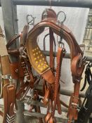 Set of brown trade harness with 22-inch collar and white metal fittings. This lot carries VAT.