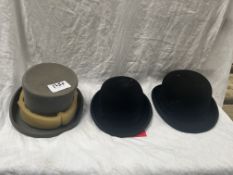 Black hard bowler hat by Christys size 6 7/8, new in box; another size 7 1/4; and a grey top hat