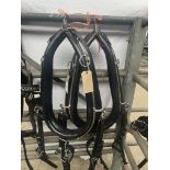 Set of PAIR black and white metal harness with 23-inch collars. This lot carries VAT.