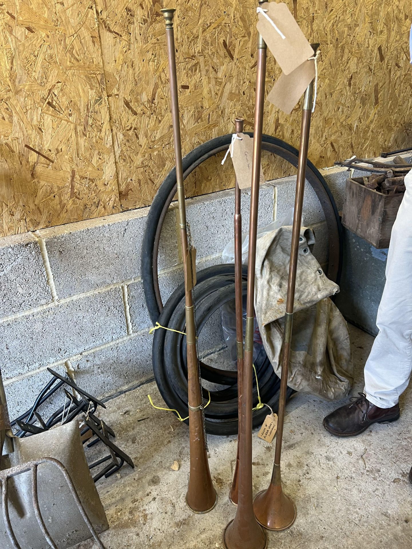 Four various copper and brass coaching horns