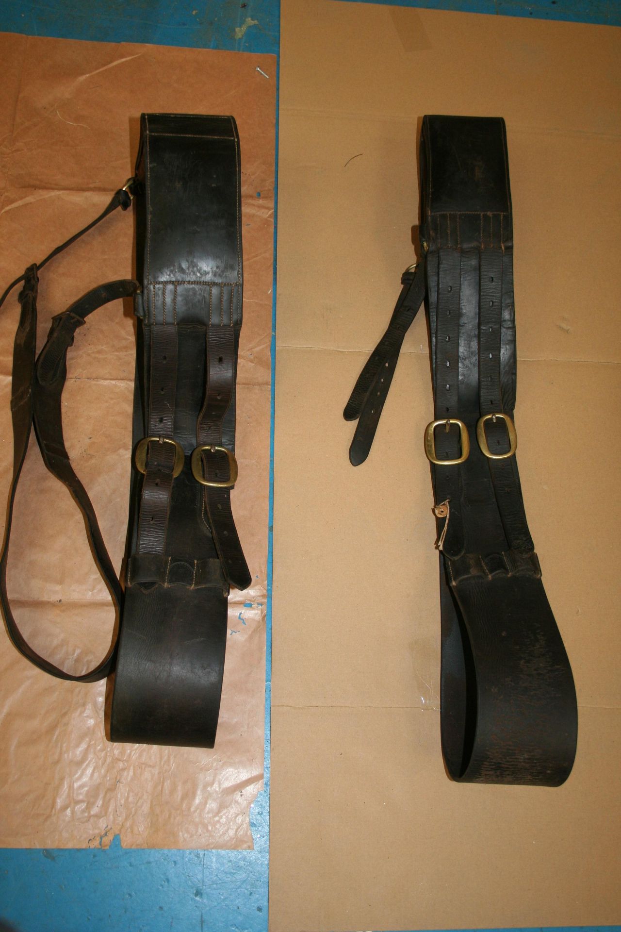 Two leather rollers
