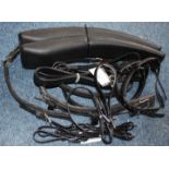 Bag of Zilco classic miscellaneous items including saddle pads and miscellaneous bridle items